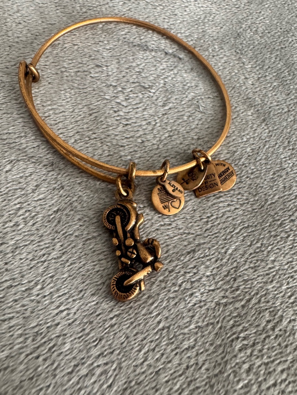 Alex and Ani gold motorcycle bracelet